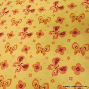 Pink Butterflies on Yellow Flannel Fabric