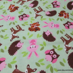 Pink Critter Toss Flannel Fabric