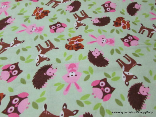 Pink Critter Toss Flannel Fabric