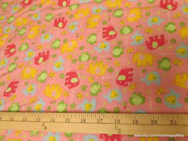 Tossed Elephants on Pink Flannel Fabric