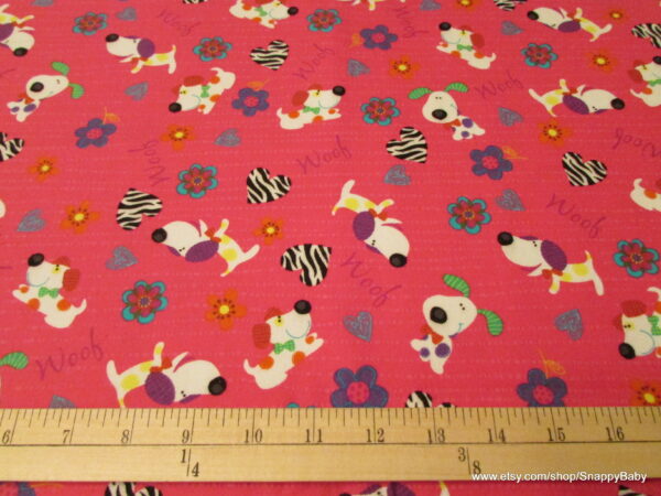 Dogs Woof Woof on Pink Flannel Fabric