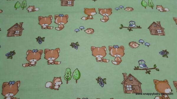 Baby Foxes on Green Flannel Fabric